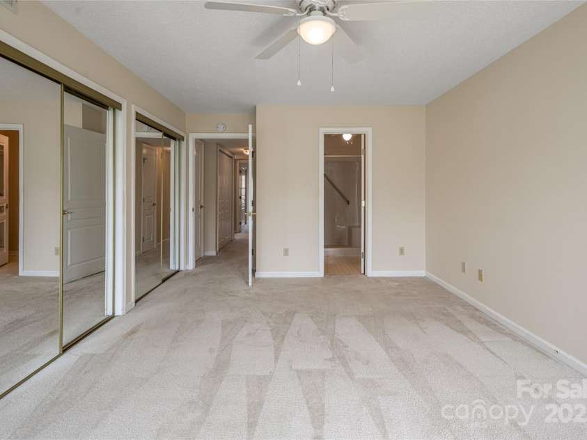 4805 Breakers Lane, Asheville, NC 28806.  MLS# CAR4307390, YatesRealty ID 2041. Primary suite with bathroom and two closets. 