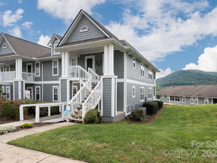 4805 Breakers Lane, Asheville, NC 28806.  MLS# CAR4307390, YatesRealty ID 2041. Side green area. 