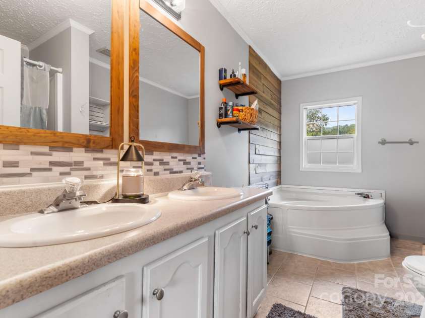 49 Perseverance Drive, Canton, NC 28716.  MLS# CAR4259278, YatesRealty ID 20414. 