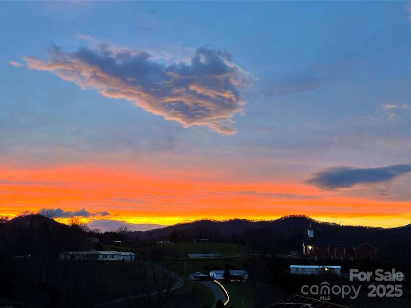 49 Perseverance Drive, Canton, NC 28716.  MLS# CAR4259278, YatesRealty ID 20414. Look at that sunset