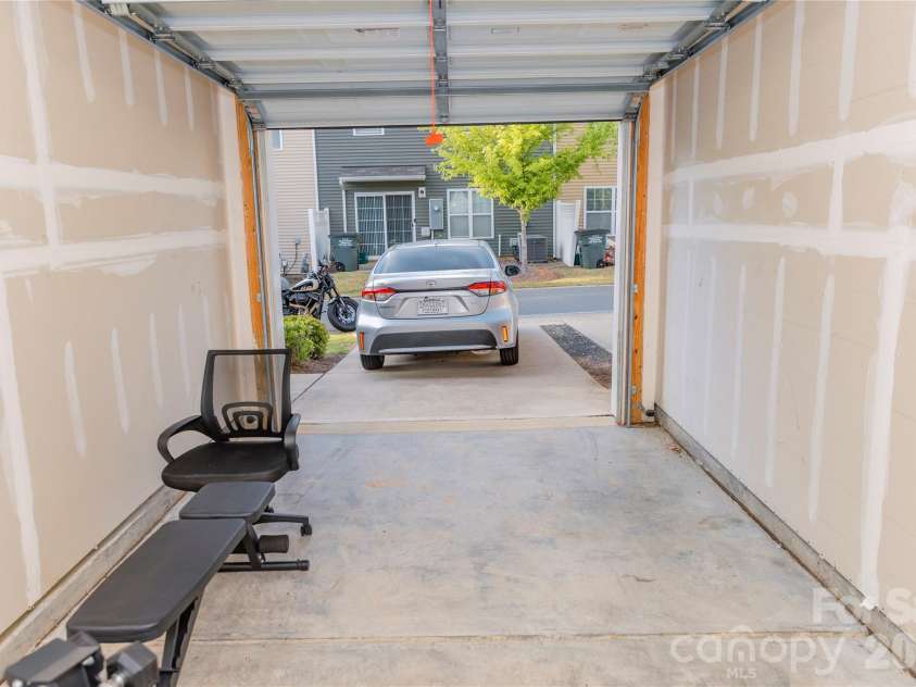 10443 Benfield Road, Charlotte, NC 28269.  MLS# CAR4380013, YatesRealty ID 20416. Garage