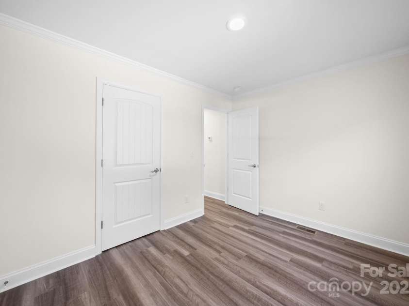 159 Hallman Street, Cherryville, NC 28021.  MLS# CAR4248221, YatesRealty ID 20416. Front Secondary Bedroom