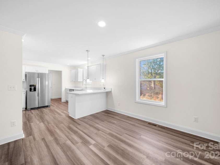 159 Hallman Street, Cherryville, NC 28021.  MLS# CAR4248221, YatesRealty ID 20416. Separate but open Dining Area