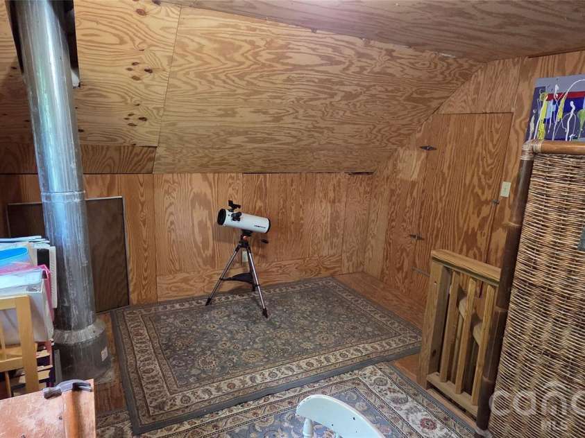 140 Elijah Hall Road, Black Mountain, NC 28711.  MLS# CAR4376953, YatesRealty ID 20420. Garage upstairs studio