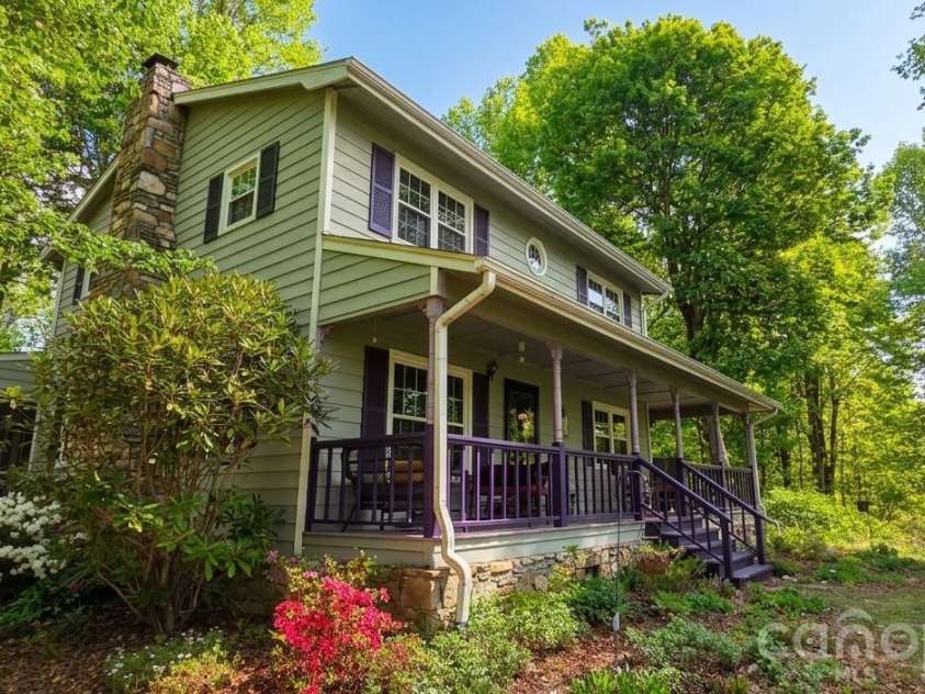 140 Elijah Hall Road, Black Mountain, NC 28711.  MLS# CAR4376953, YatesRealty ID 20420. Side of home