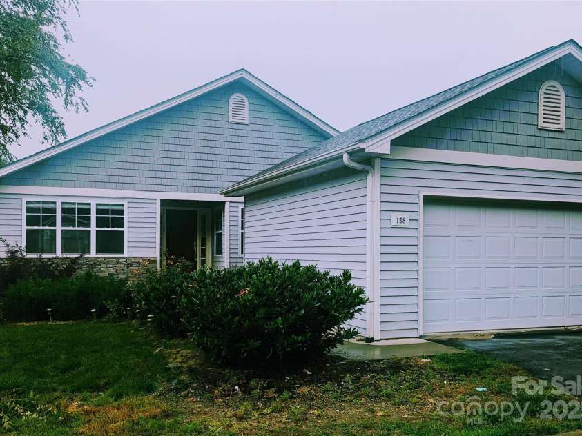 158 Clear Creekside Drive, Hendersonville, NC 28792.  MLS# CAR4265062, YatesRealty ID 20420. 