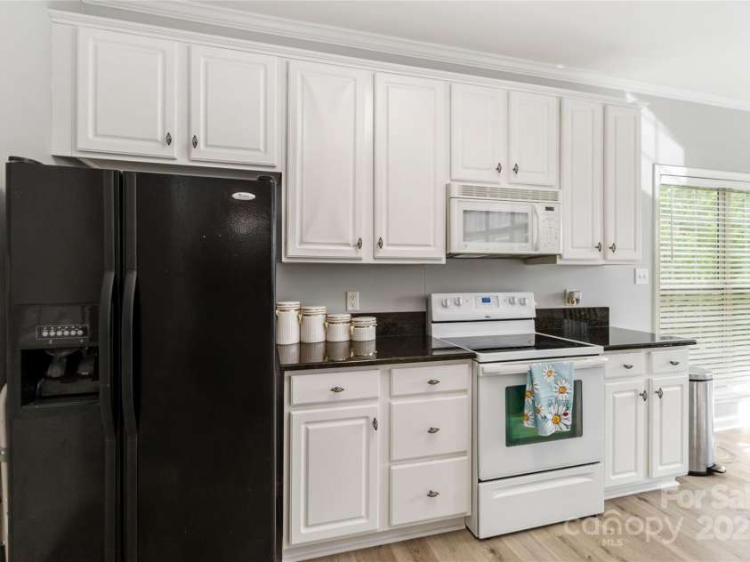 7704 Ninth Fairway Lane, Mint Hill, NC 28227.  MLS# CAR4267210, YatesRealty ID 20421. 