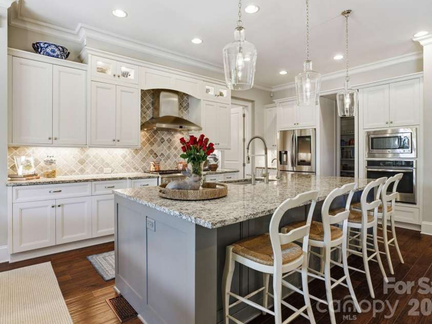 147 Torrence Chapel Road, Mooresville, NC 28117.  MLS# CAR4376776, YatesRealty ID 20424. Countertops gallore! 