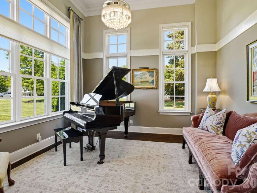 147 Torrence Chapel Road, Mooresville, NC 28117.  MLS# CAR4376776, YatesRealty ID 20424. Front den/home office with tall ceilings. 