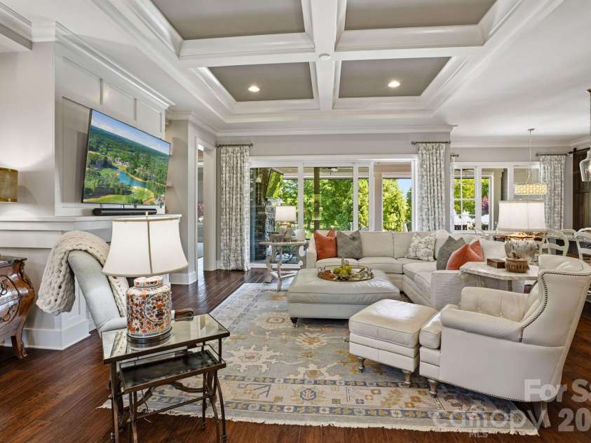 147 Torrence Chapel Road, Mooresville, NC 28117.  MLS# CAR4376776, YatesRealty ID 20424. Great room with coffered ceiling and built-ins.