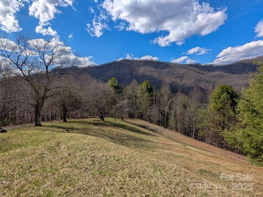 72 Pilgrims Lane, Burnsville, NC 28714.  MLS# CAR4163006, YatesRealty ID 20425. Winter View from driveway of property