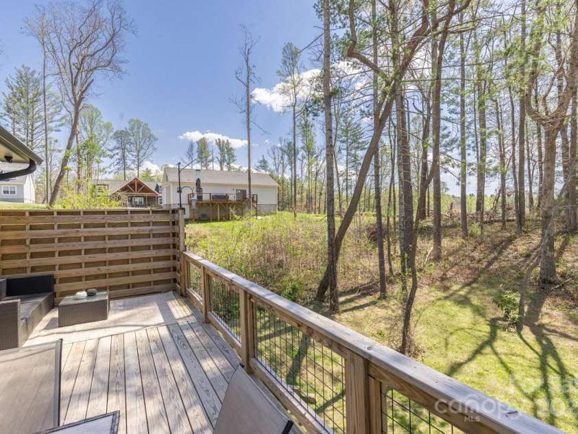 209 Fall Leaves Drive, Fairview, NC 28730.  MLS# CAR4312679, YatesRealty ID 20427. Back deck space.