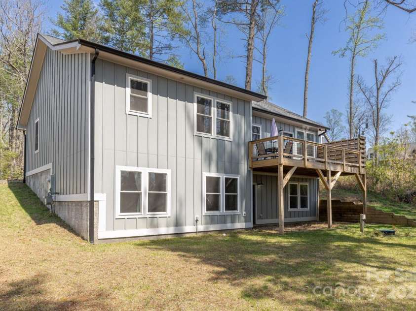 209 Fall Leaves Drive, Fairview, NC 28730.  MLS# CAR4312679, YatesRealty ID 20427. Back of home.