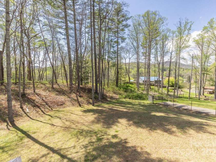 209 Fall Leaves Drive, Fairview, NC 28730.  MLS# CAR4312679, YatesRealty ID 20427. Back yard with a view.