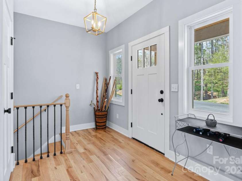 209 Fall Leaves Drive, Fairview, NC 28730.  MLS# CAR4312679, YatesRealty ID 20427. Entry way with coat closet.