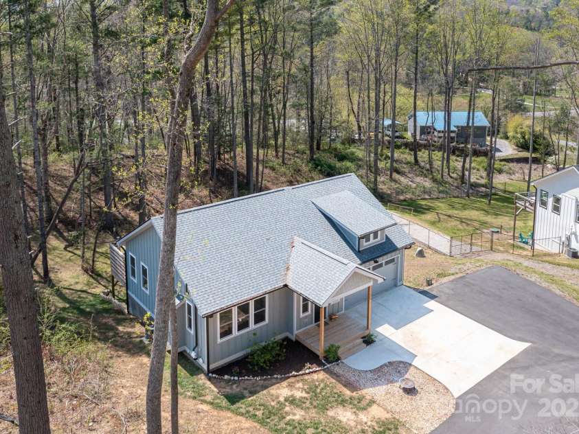 209 Fall Leaves Drive, Fairview, NC 28730.  MLS# CAR4312679, YatesRealty ID 20427. Front aerial view.