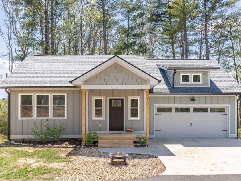 209 Fall Leaves Drive, Fairview, NC 28730.  MLS# CAR4312679, YatesRealty ID 20427. Front of home.