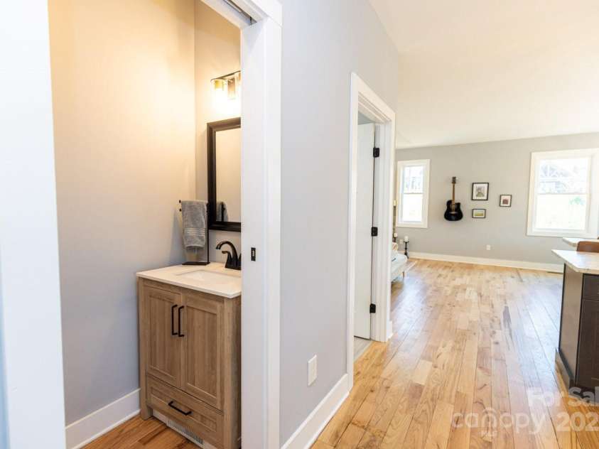 209 Fall Leaves Drive, Fairview, NC 28730.  MLS# CAR4312679, YatesRealty ID 20427. Half bath.