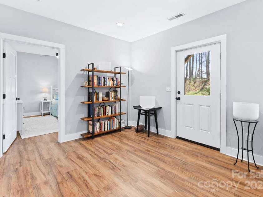 209 Fall Leaves Drive, Fairview, NC 28730.  MLS# CAR4312679, YatesRealty ID 20427. Lower level entry way.