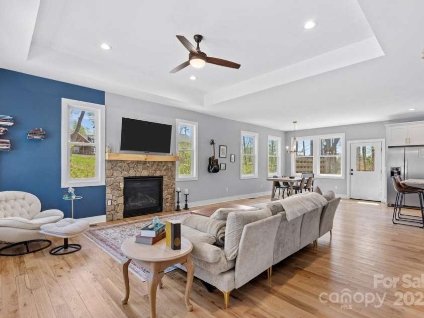 209 Fall Leaves Drive, Fairview, NC 28730.  MLS# CAR4312679, YatesRealty ID 20427. Open living space.