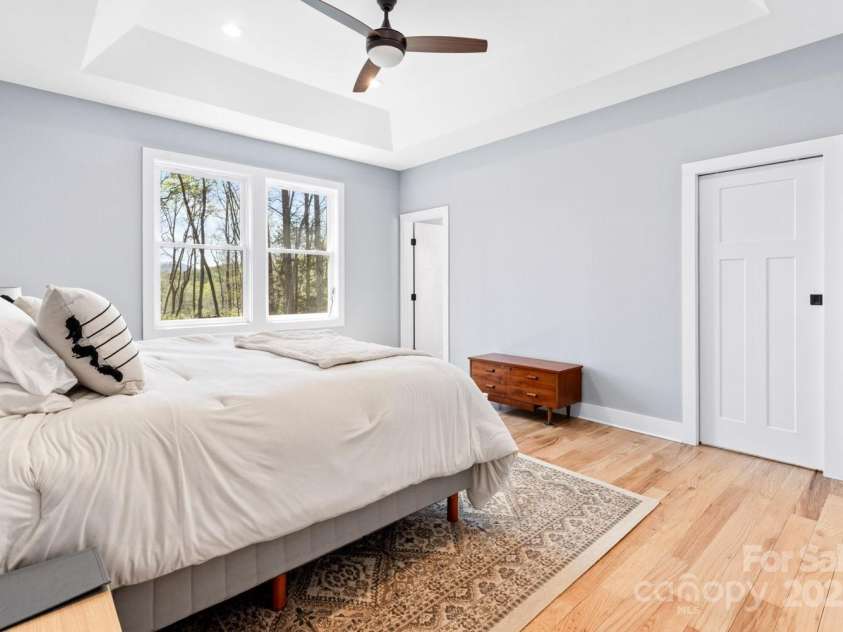 209 Fall Leaves Drive, Fairview, NC 28730.  MLS# CAR4312679, YatesRealty ID 20427. Primary bedroom.