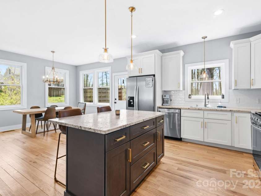 209 Fall Leaves Drive, Fairview, NC 28730.  MLS# CAR4312679, YatesRealty ID 20427. Spacious kitchen and dining.