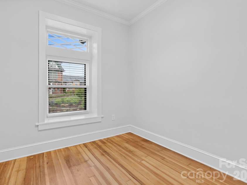 134 Biltmore Avenue, Asheville, NC 28801.  MLS# CAR4375407, YatesRealty ID 20428. Front office in upper level