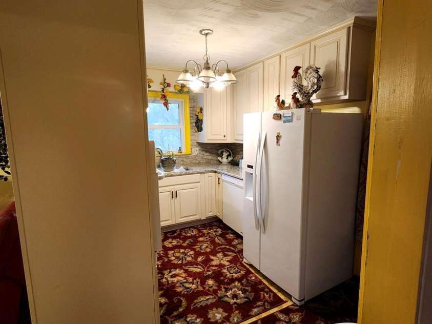 406 Caldwell Avenue, Newton, NC 28658.  MLS# CAR4248372, YatesRealty ID 20431. 