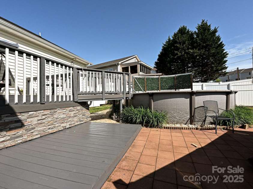 1009 Preston Drive, Lowell, NC 28098.  MLS# CAR4248227, YatesRealty ID 20432. ABOVE GROUND POOL AND PATIO AREA