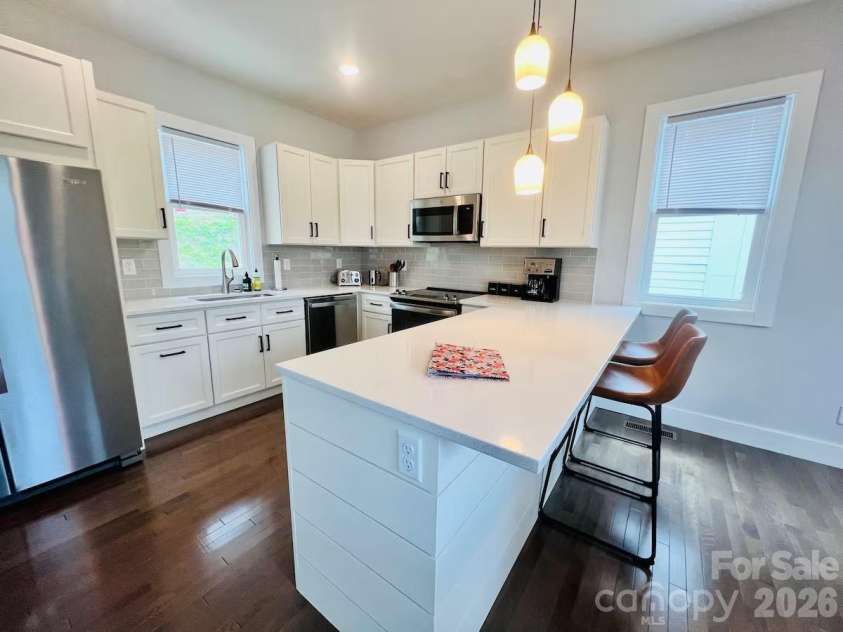 1061 and 1063 Riverside Drive, Asheville, NC 28804.  MLS# CAR4333567, YatesRealty ID 2044. 