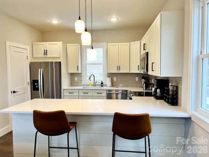 1061 and 1063 Riverside Drive, Asheville, NC 28804.  MLS# CAR4333567, YatesRealty ID 2044. 