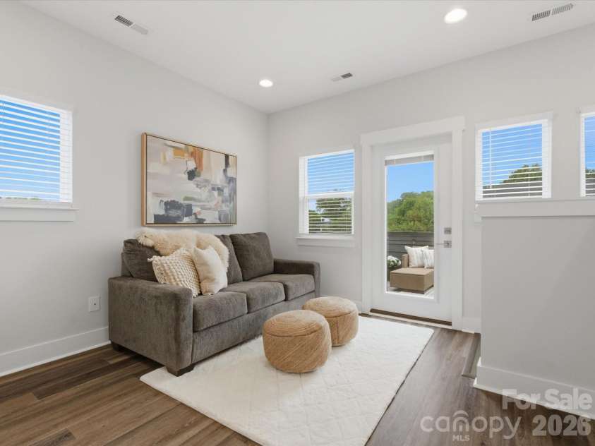 606 West End Drive, Charlotte, NC 28208.  MLS# CAR4369198, YatesRealty ID 20441. With access to the rooftop patio