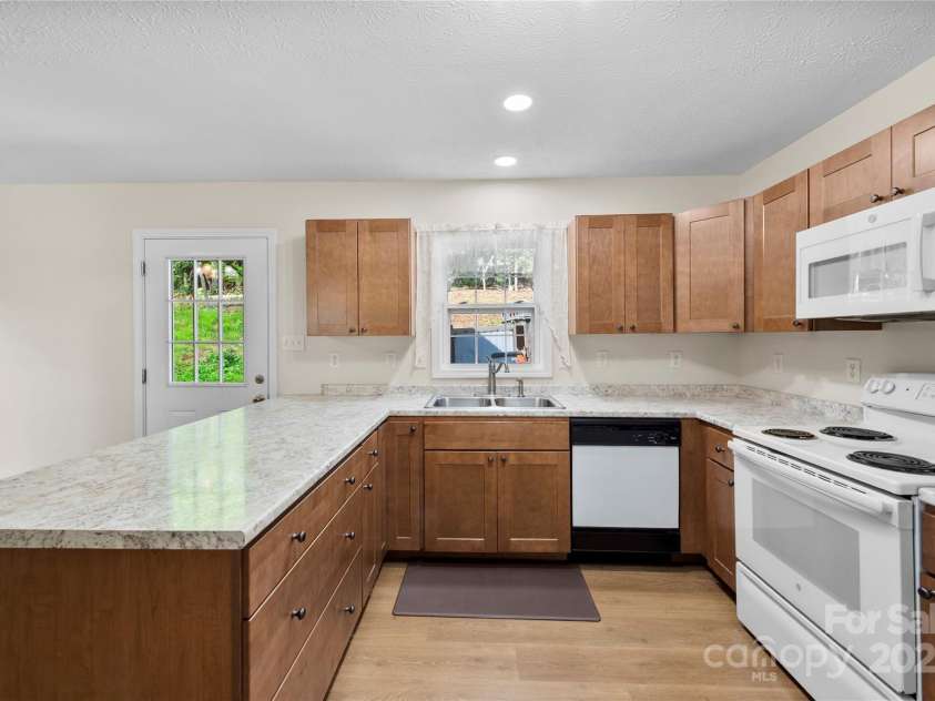 55 Gilbert B Crook Road, Candler, NC 28715.  MLS# CAR4268446, YatesRealty ID 20443. 