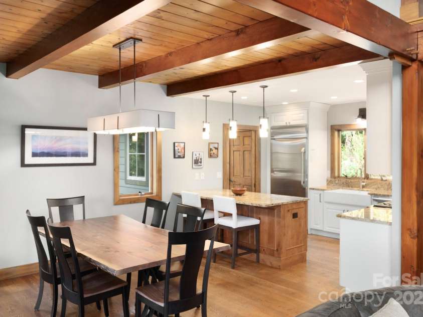 499 Warbler Lane, Black Mountain, NC 28711.  MLS# CAR4230547, YatesRealty ID 2045. Dining Area with Exposed Beams