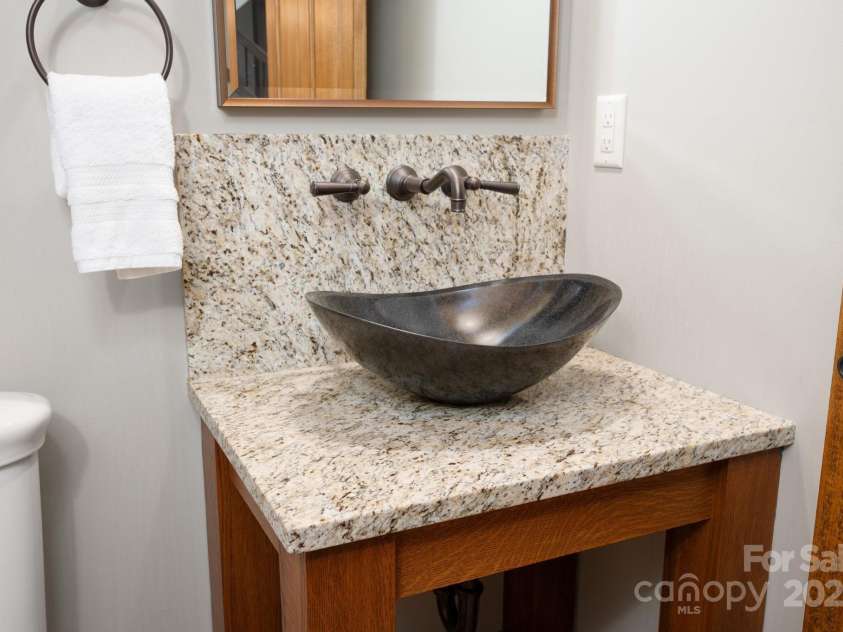 499 Warbler Lane, Black Mountain, NC 28711.  MLS# CAR4230547, YatesRealty ID 2045. Half Bath off the Foyer