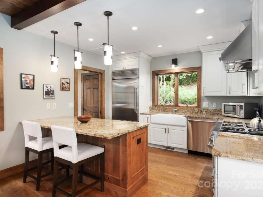 499 Warbler Lane, Black Mountain, NC 28711.  MLS# CAR4230547, YatesRealty ID 2045. Kitchen Breakfast Bar with Pendant Lighting