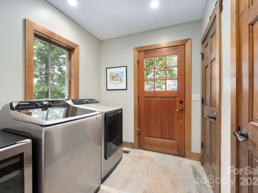 499 Warbler Lane, Black Mountain, NC 28711.  MLS# CAR4230547, YatesRealty ID 2045. Laundry Mud Room off Kitchen