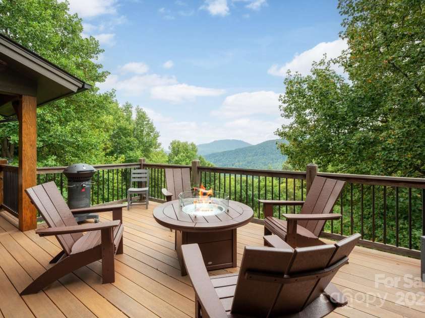 499 Warbler Lane, Black Mountain, NC 28711.  MLS# CAR4230547, YatesRealty ID 2045. Outdoor seating and lounge area