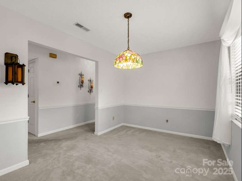 3101 Saint Augustine Place, Asheville, NC 28805.  MLS# CAR4260431, YatesRealty ID 20455. Dining Room Space. Or use as Office/Bonus Room.