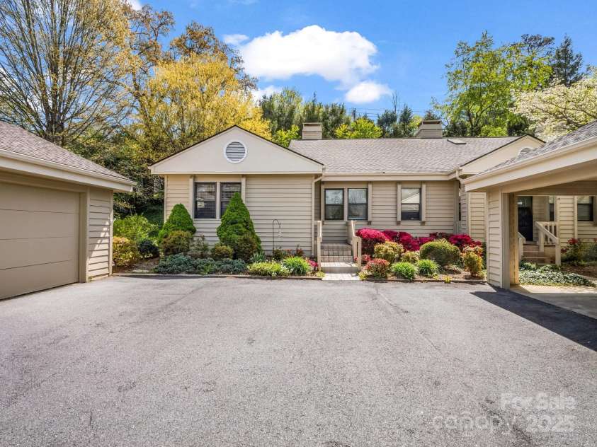 3101 Saint Augustine Place, Asheville, NC 28805.  MLS# CAR4260431, YatesRealty ID 20455. Front entrance with lovely landscaping.