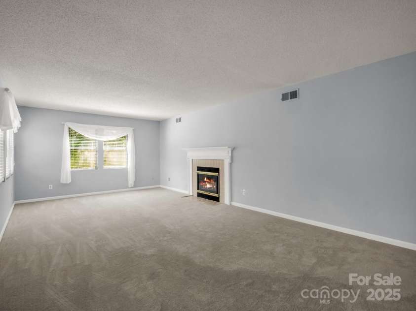 3101 Saint Augustine Place, Asheville, NC 28805.  MLS# CAR4260431, YatesRealty ID 20455. Spacious Living Room with Gas Fireplace