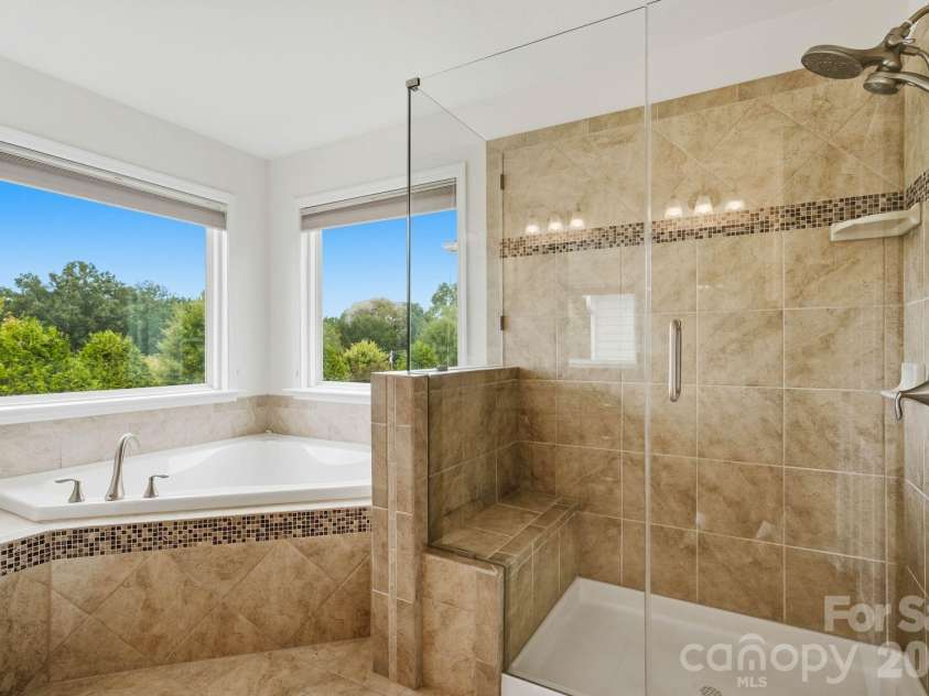 108 Heron Cove Loop, Mooresville, NC 28117.  MLS# CAR4427585, YatesRealty ID 20457. Primary ensuite bathroom