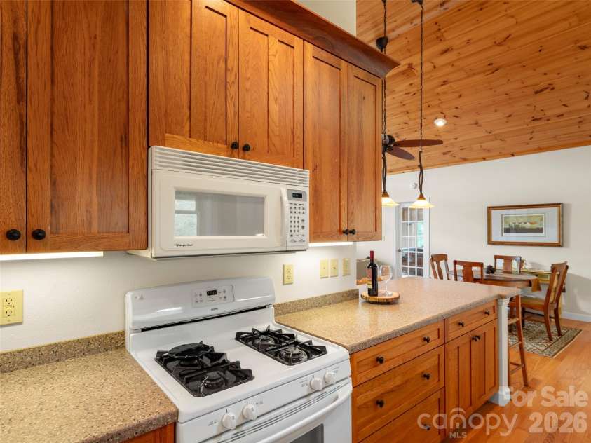 88 Brown Bear Way, Waynesville, NC 28786.  MLS# CAR4307371, YatesRealty ID 2046. Kitchen features under cabinet lighting 