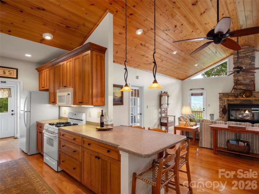 88 Brown Bear Way, Waynesville, NC 28786.  MLS# CAR4307371, YatesRealty ID 2046. Kitchen with Breakfast Bar & Work Area