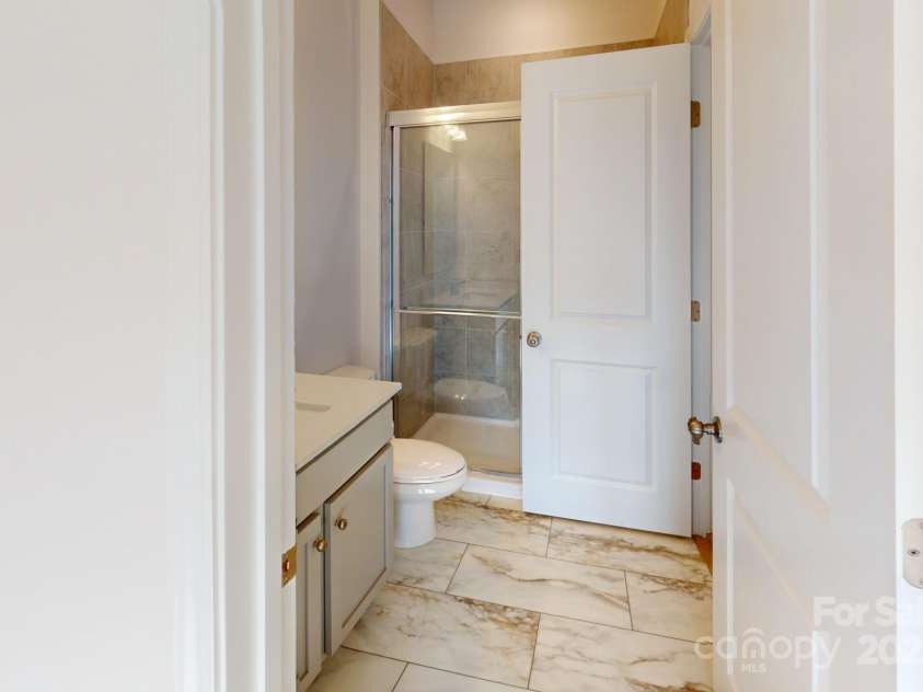 1817 Augustine Street, Monroe, NC 28112.  MLS# CAR4255317, YatesRealty ID 20460. Guest suite bathroom