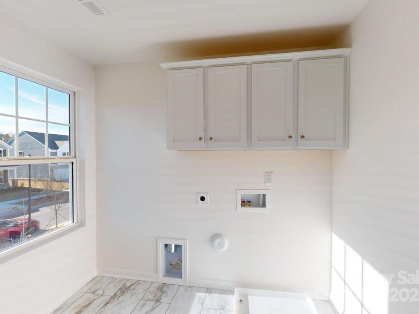 1817 Augustine Street, Monroe, NC 28112.  MLS# CAR4255317, YatesRealty ID 20460. Laundry room