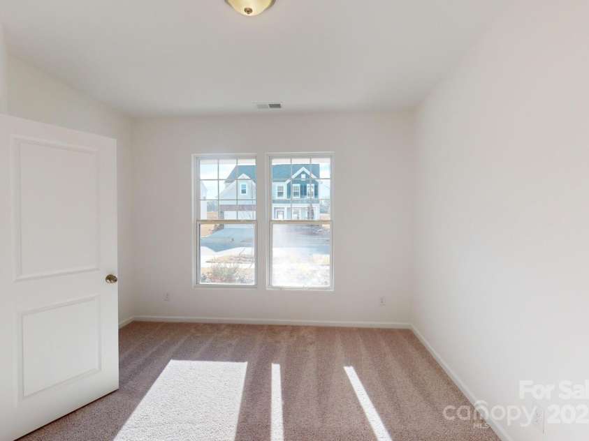 1817 Augustine Street, Monroe, NC 28112.  MLS# CAR4255317, YatesRealty ID 20460. Main level guest suite