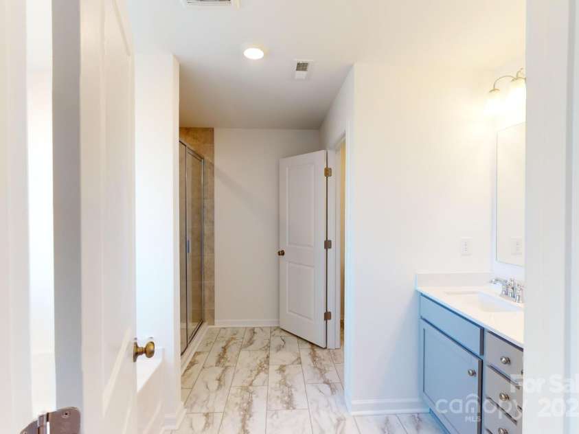 1817 Augustine Street, Monroe, NC 28112.  MLS# CAR4255317, YatesRealty ID 20460. Owners bathroom