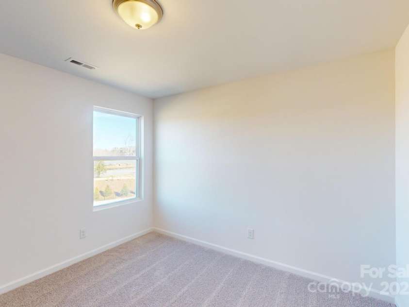 1817 Augustine Street, Monroe, NC 28112.  MLS# CAR4255317, YatesRealty ID 20460. Secondary bedroom