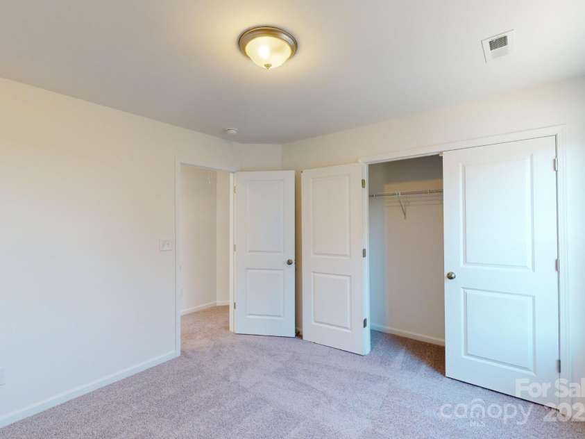 1817 Augustine Street, Monroe, NC 28112.  MLS# CAR4255317, YatesRealty ID 20460. Secondary bedroom
